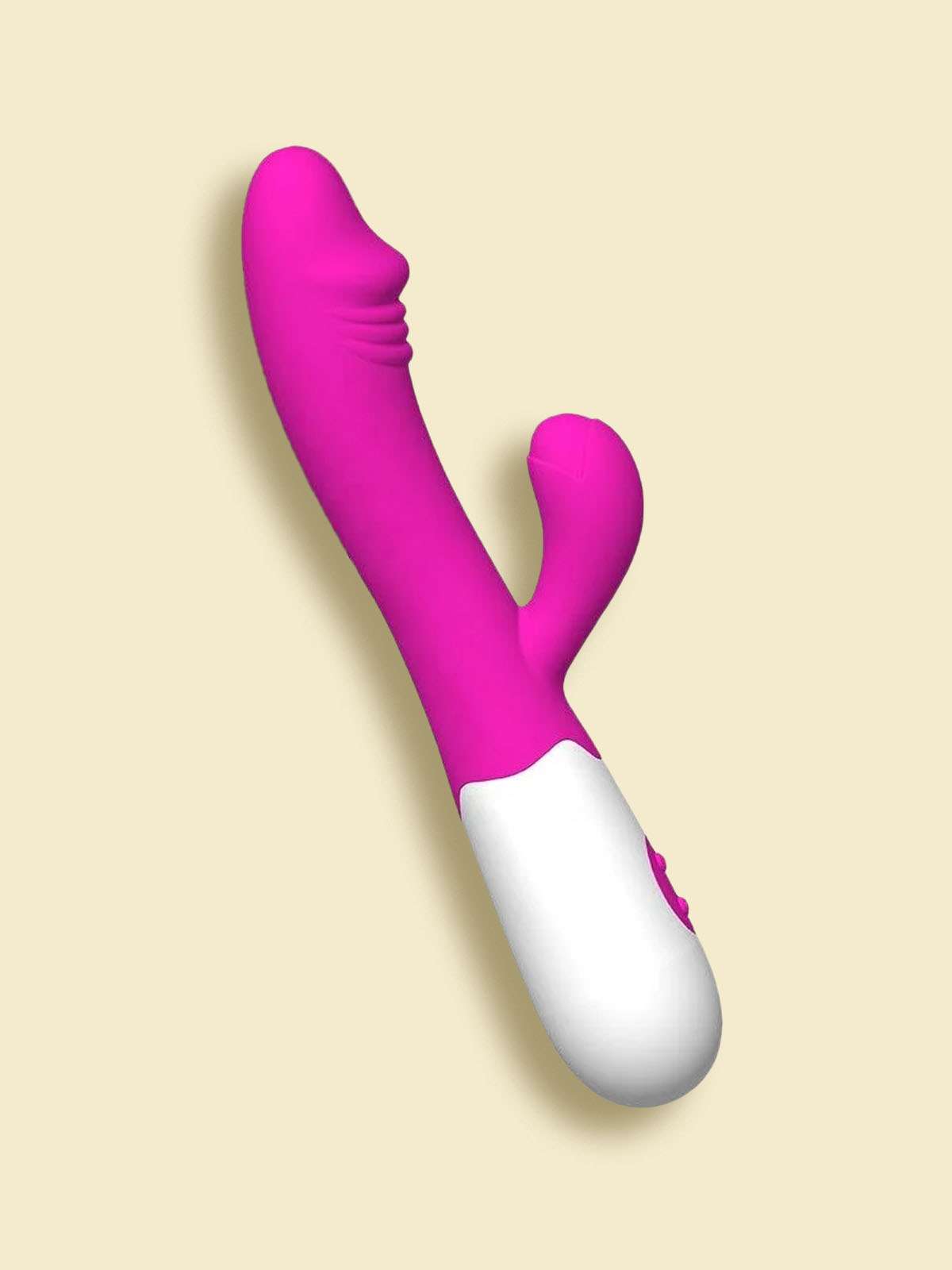Pink and white Rechargeable Rabbit Vibrator for dual internal and external stimulation.