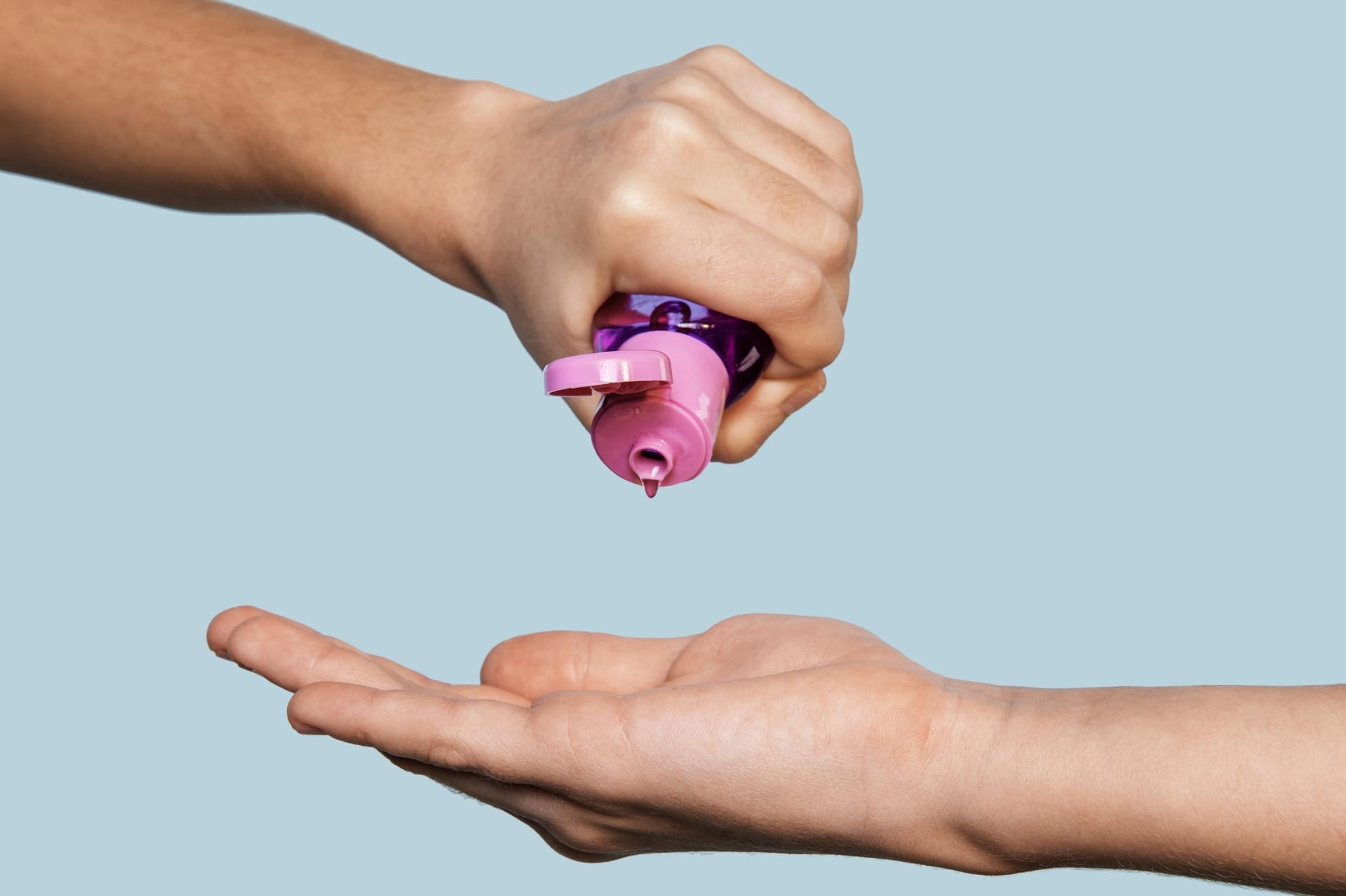 Comparison of water-based, silicone-based, and hybrid lubricant bottles